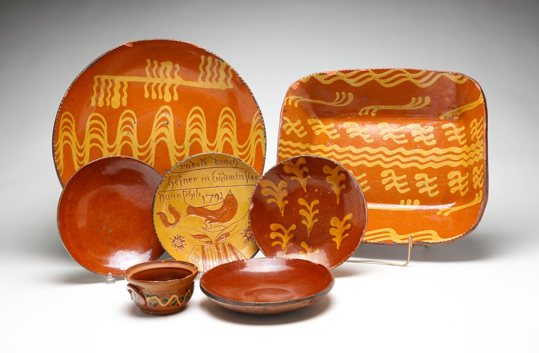 SEVEN SHOONER REDWARE PIECES. (1 of 10)