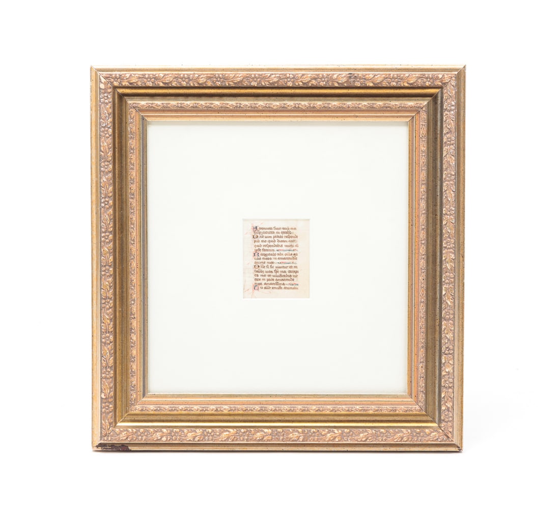 MANUSCRIPT LEAF.: Europe, most likely 15th Century. Pen and ink on vellum. Latin text with painted calligraphic letters. Framed, 14.75"h. 14.25"w.