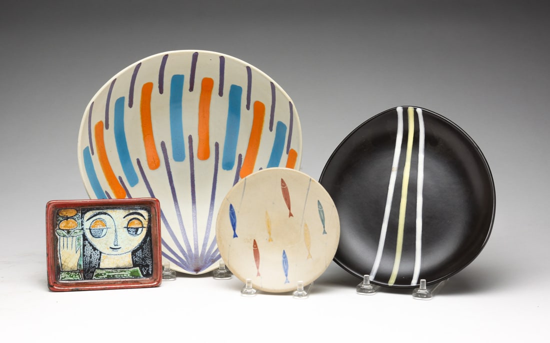 FOUR MID CENTURY MODERN POTTERY.: Scandinavian, mid 20th Century. Two small wall plaques. Figure marked "Denmark, M.A. & S." (Michael Anderson & Sons), 3.5"h. 4.5"w., and unmarked fish, 5"d. Together with two dishes. One "Le Sweden" w