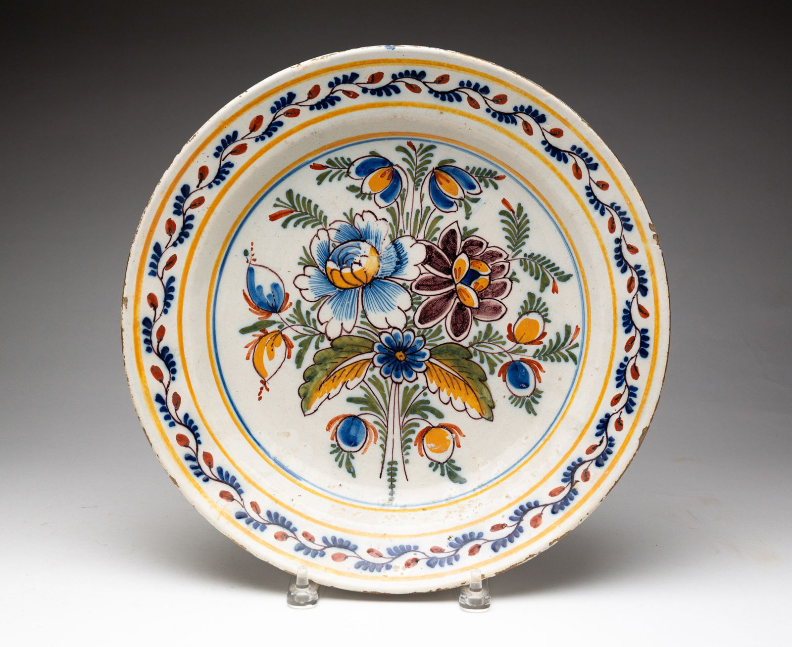 DELFT CHARGER WITH POLYCHROME DECORATION. (1 of 4)
