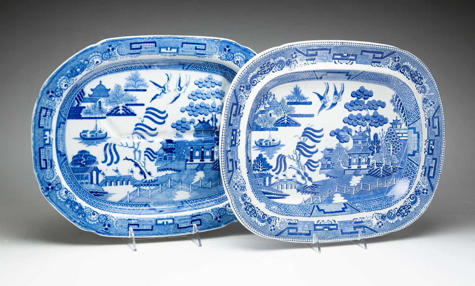TWO STAFFORDSHIRE "BLUE WILLOW" PATTERN PLATTERS. (1 of 5)