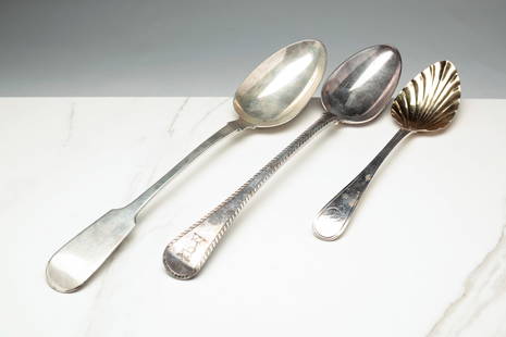 THREE STERLING SERVING SPOONS.: English. A Chester fiddle back stuffing spoon, Joseph Walley dated 1775. 12.75" l., a London stuffing spoon with gadrooned edge, Richard Crossley and George Smith dated 1808 and a London serving spoon