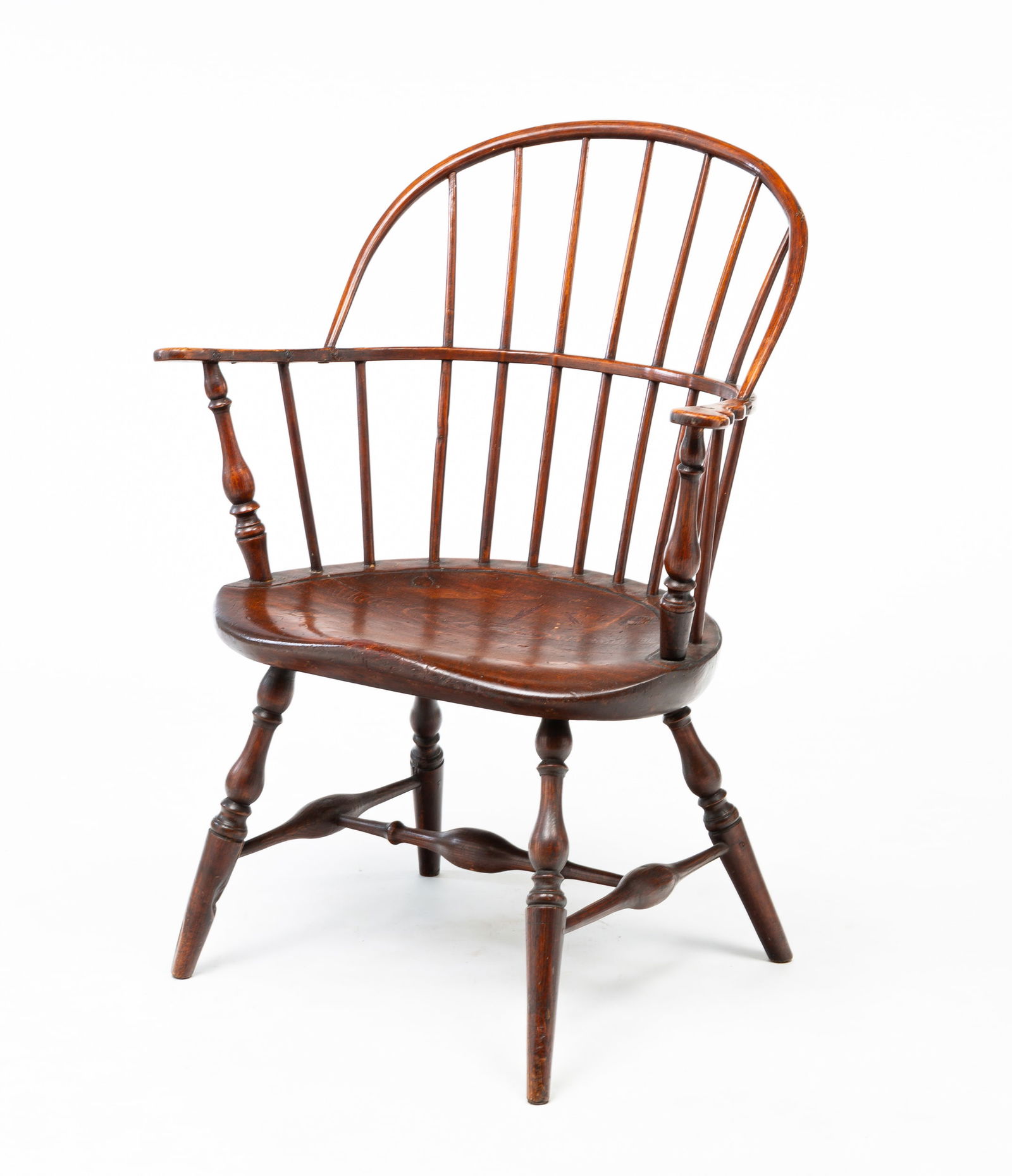 A SACKBACK WINDSOR ARMCHAIR. (1 of 4)