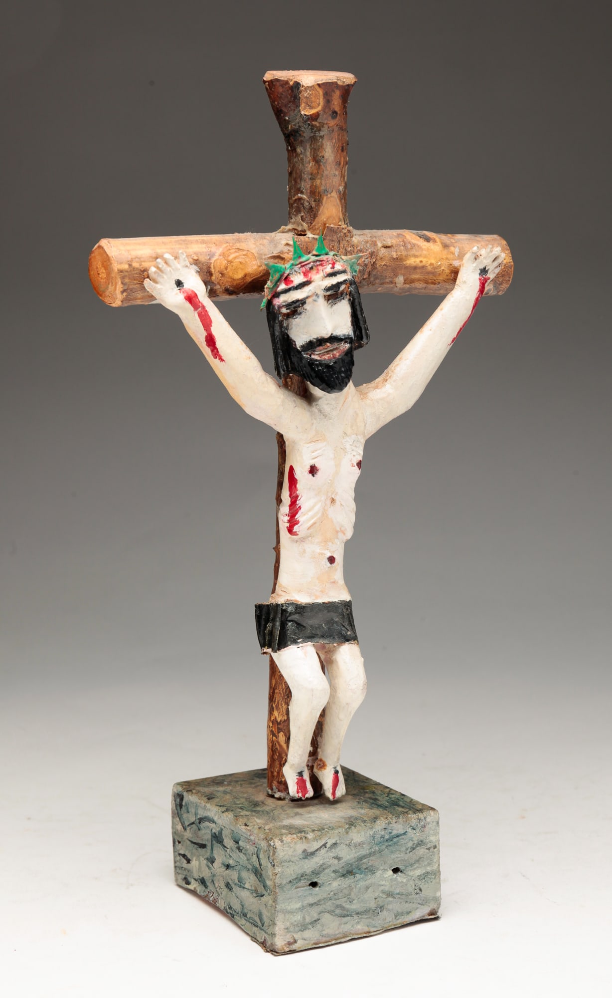 PRIMITIVE CHRISTO.: American (Michigan). Wood carved with tin crown of thorns.