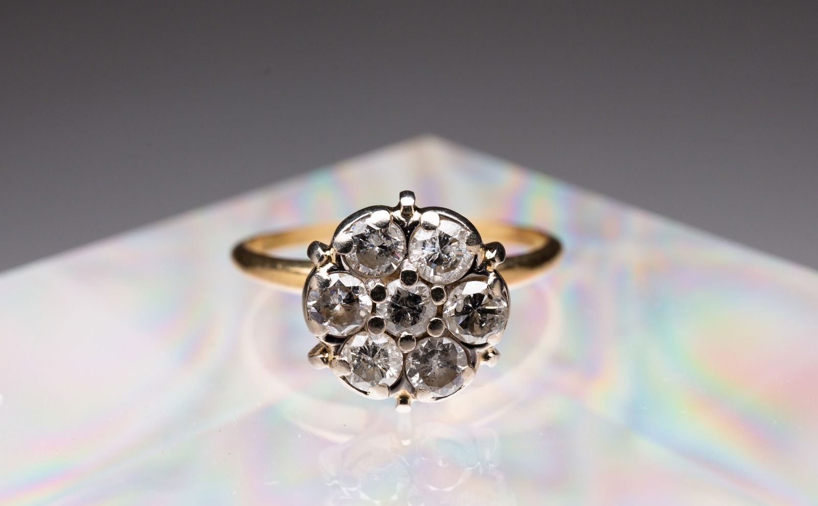 GOLD AND DIAMOND FLOWER FORM RING. (1 of 3)