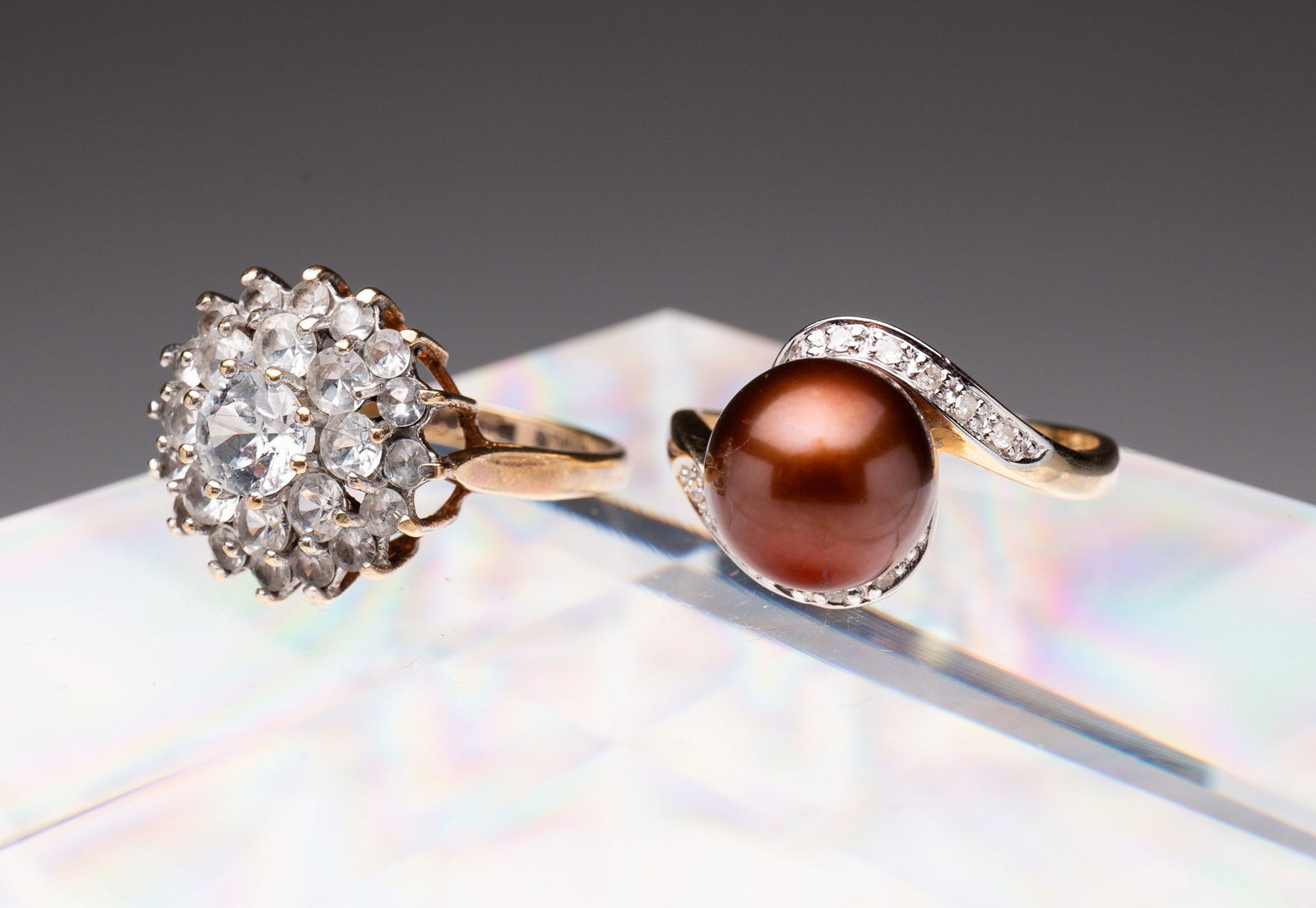 TWO LADIES GOLD AND GEMSTONE RINGS. (1 of 3)