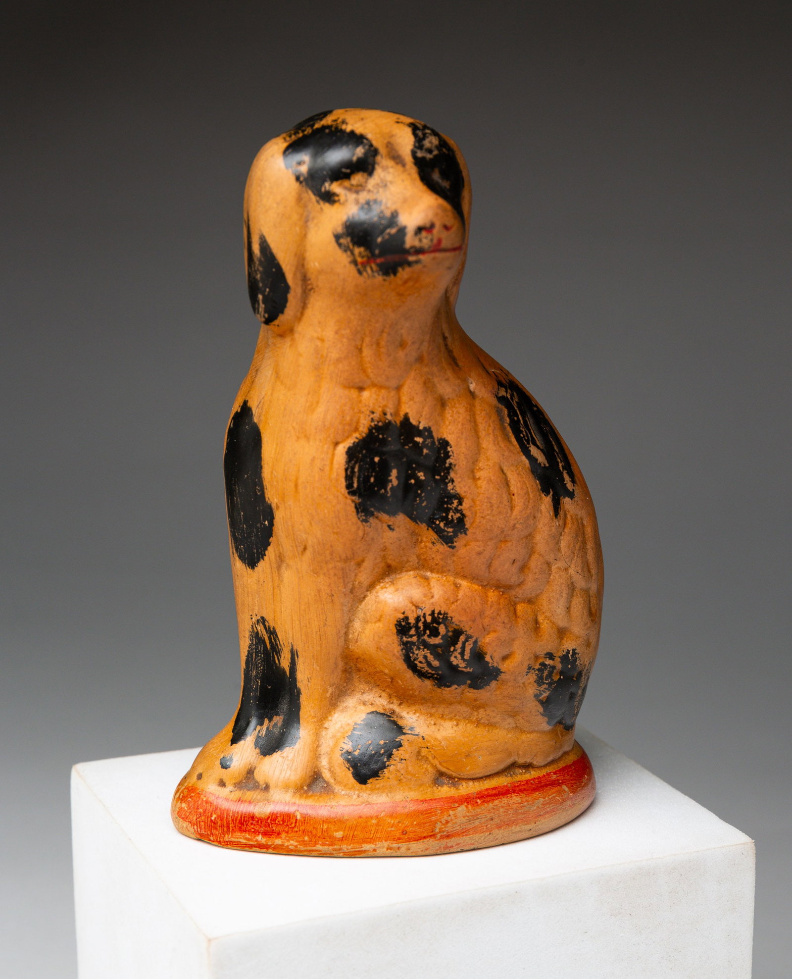 YELLOW WARE FIGURAL BANK. (1 of 3)