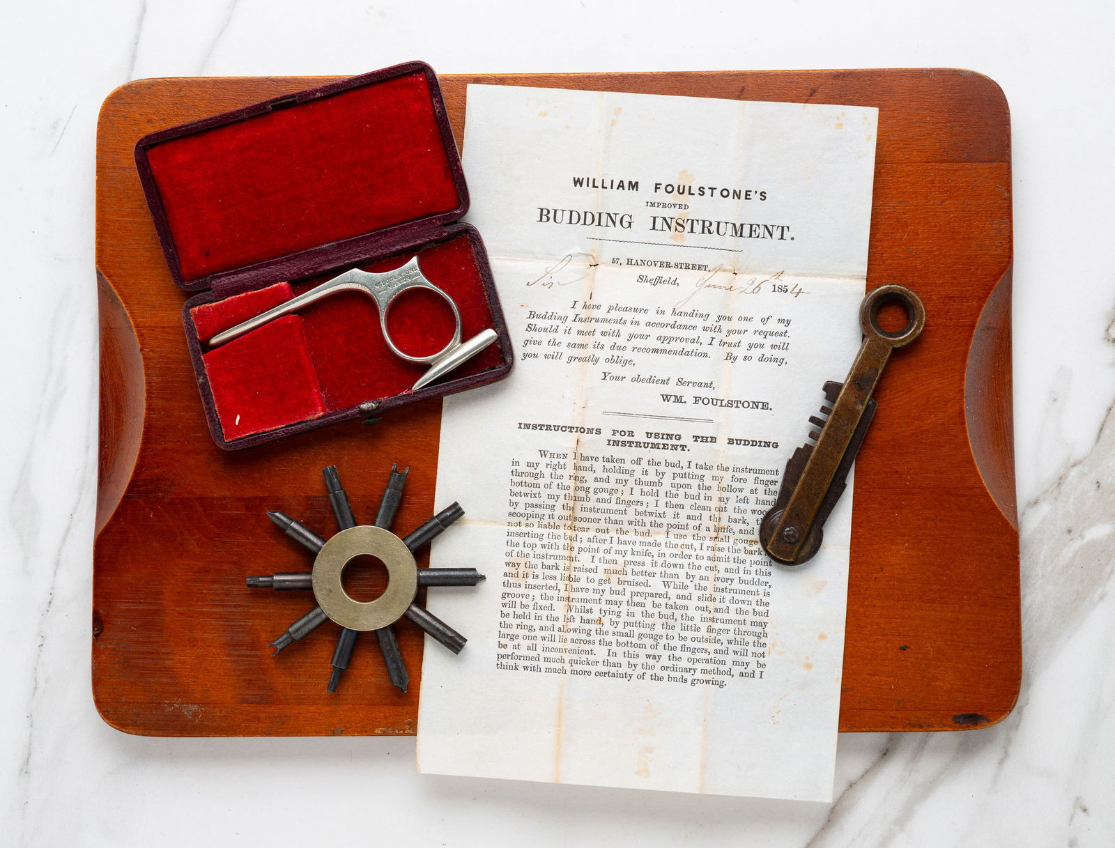 TWO ANTIQUE KEYS AND BUDDING INSTRUMENT. (1 of 5)
