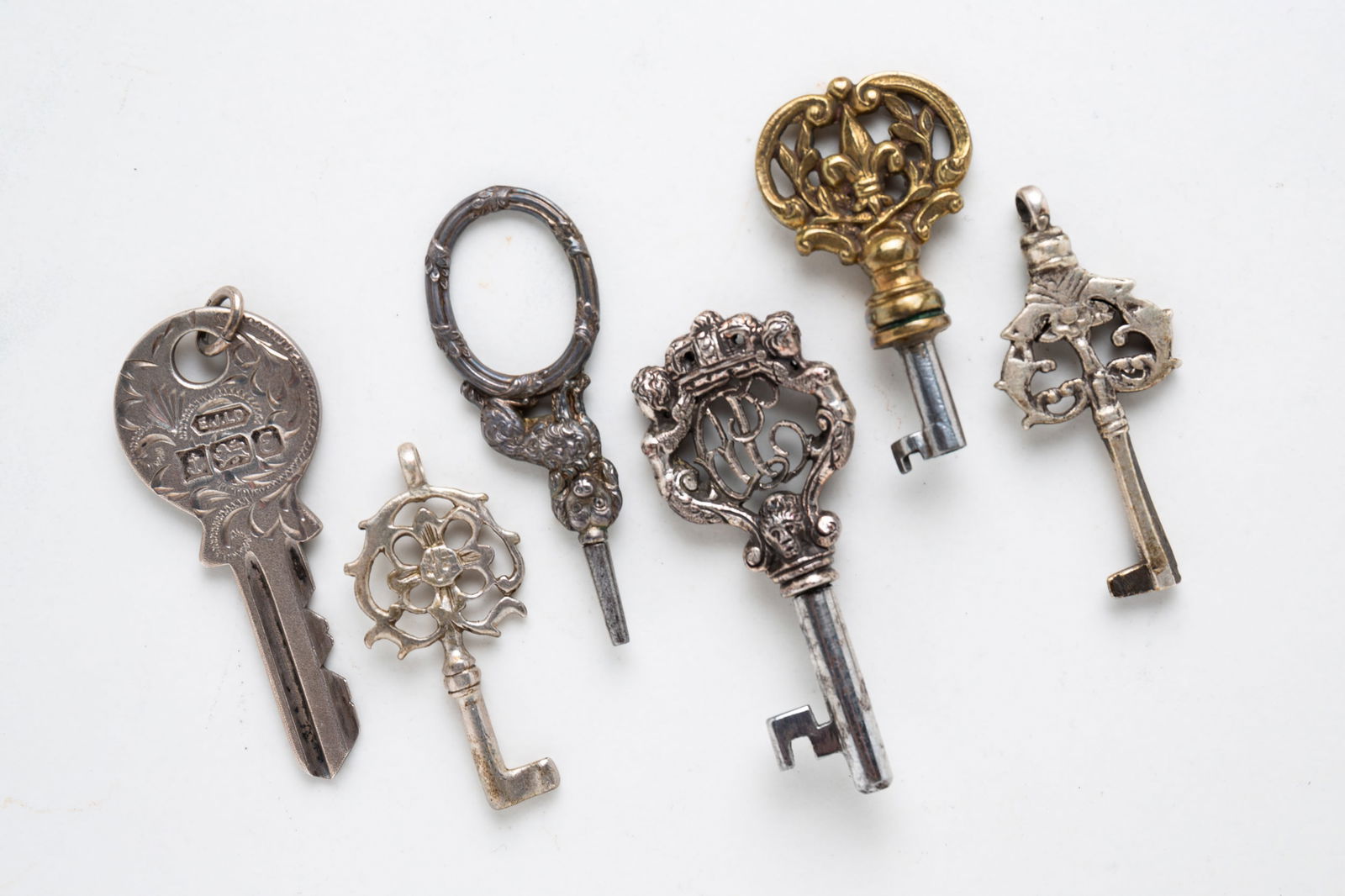 SIX SMALL KEYS. (1 of 4)