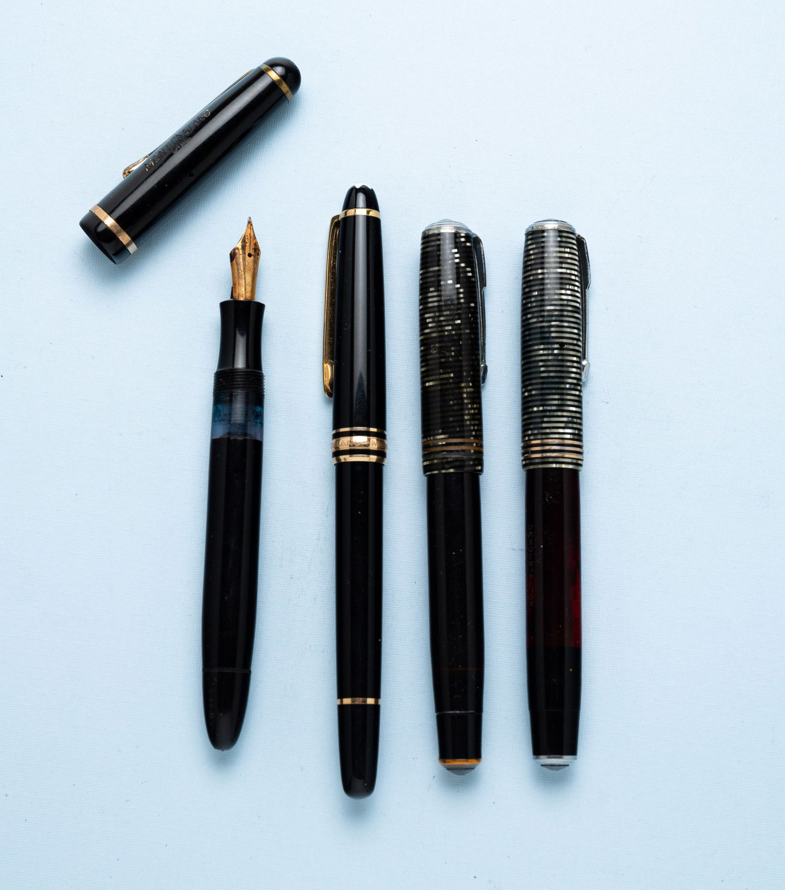 TWO PARKER DEMONSTRATOR FOUNTAIN PENS AND TWO MONTBLANC PENS. (1 of 1)