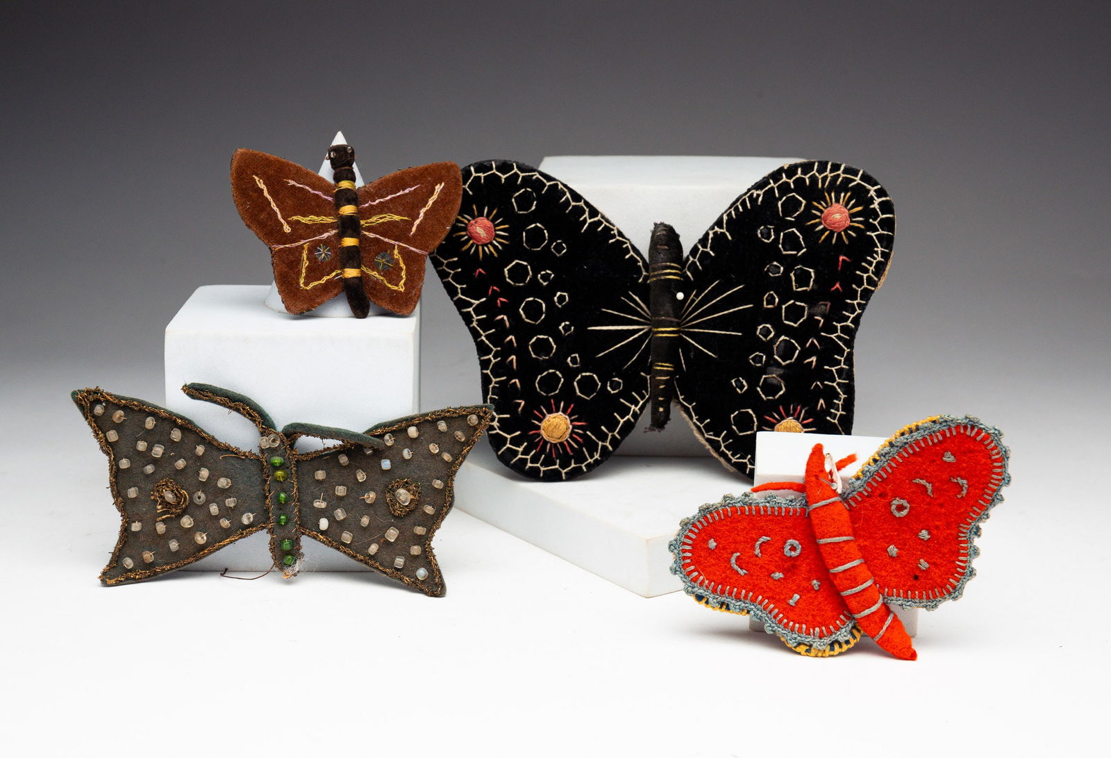 FOUR MOTH PINCUSHIONS. (1 of 3)