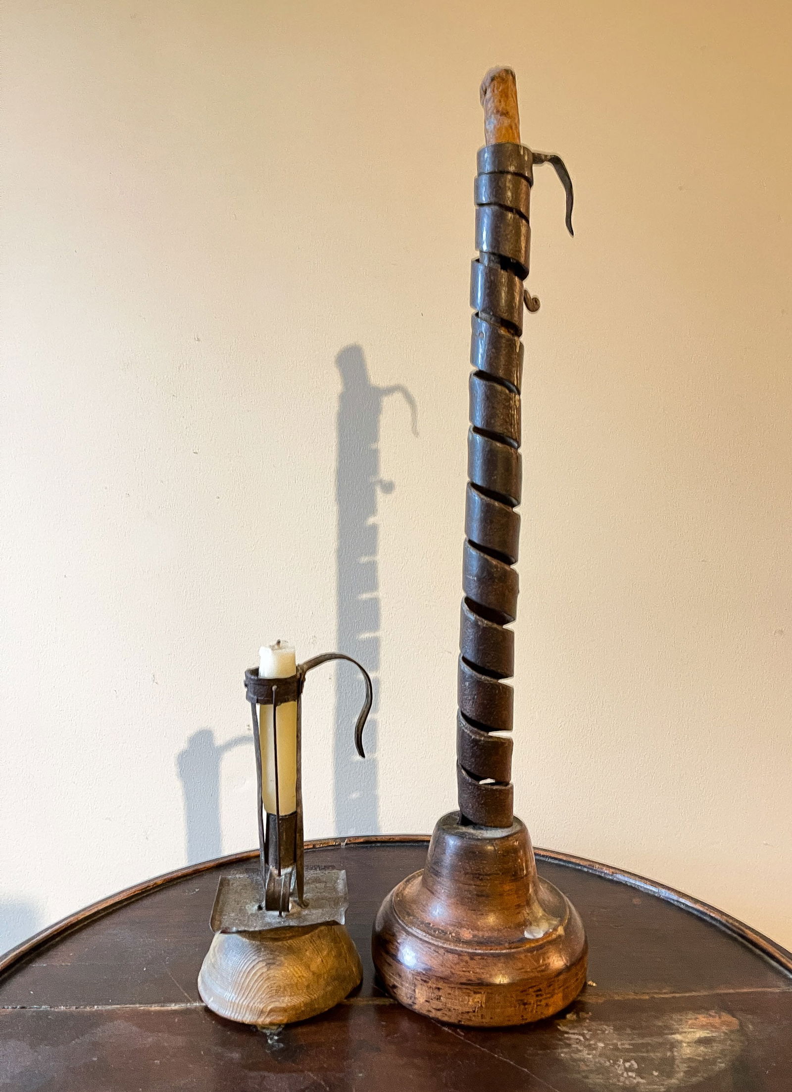 TWO WROUGHT IRON CANDLESTICKS. (1 of 5)