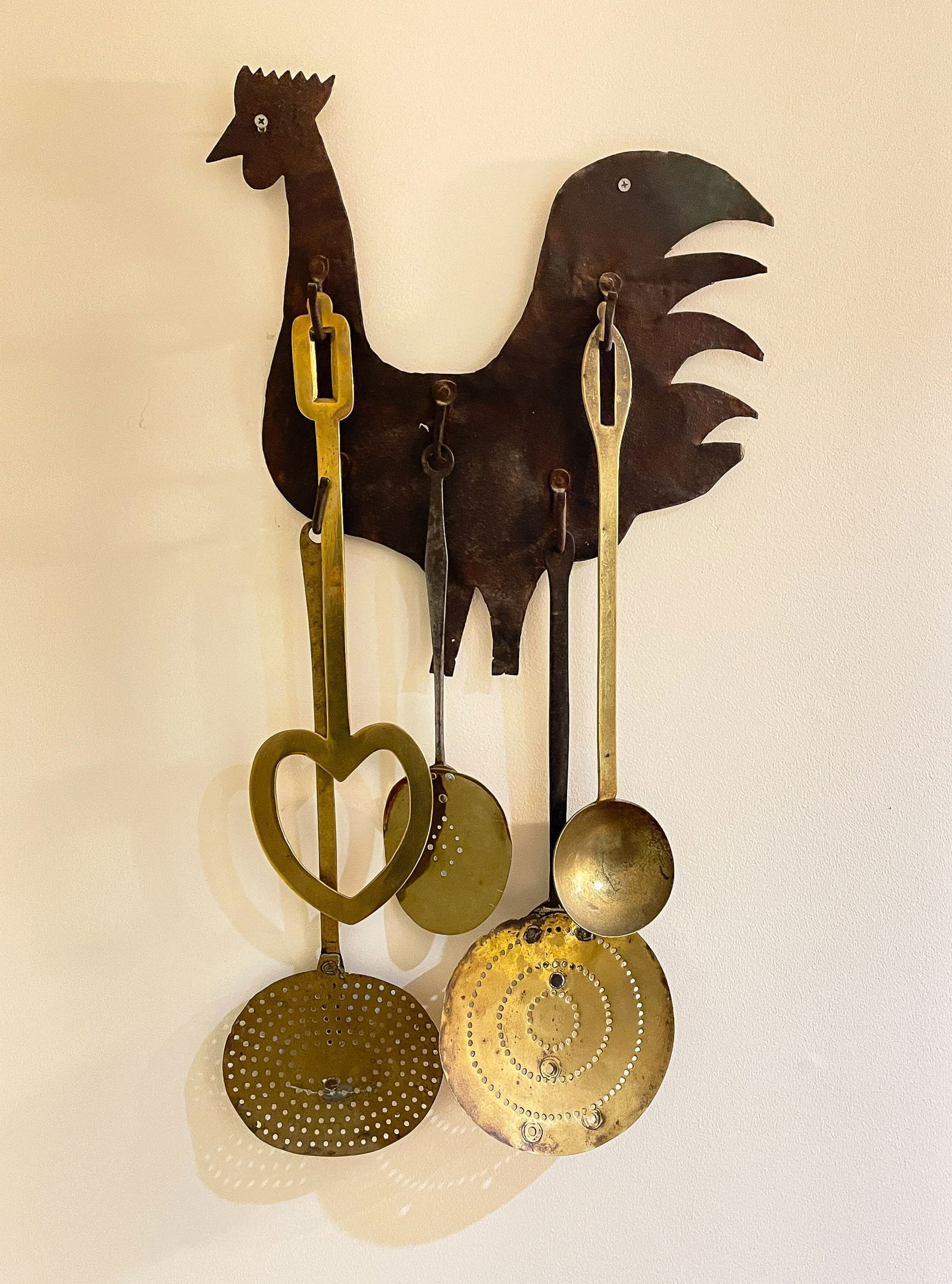 SHEET IRON ROOSTER WITH FIVE BRASS KITCHEN UTENSILS. (1 of 3)