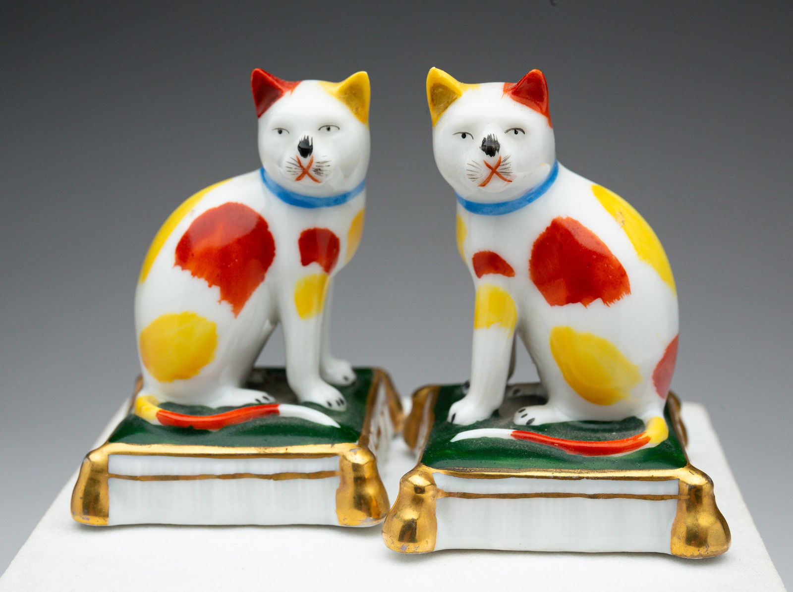 PAIR OF STAFFORDSHIRE PORCELAIN CATS. (1 of 3)