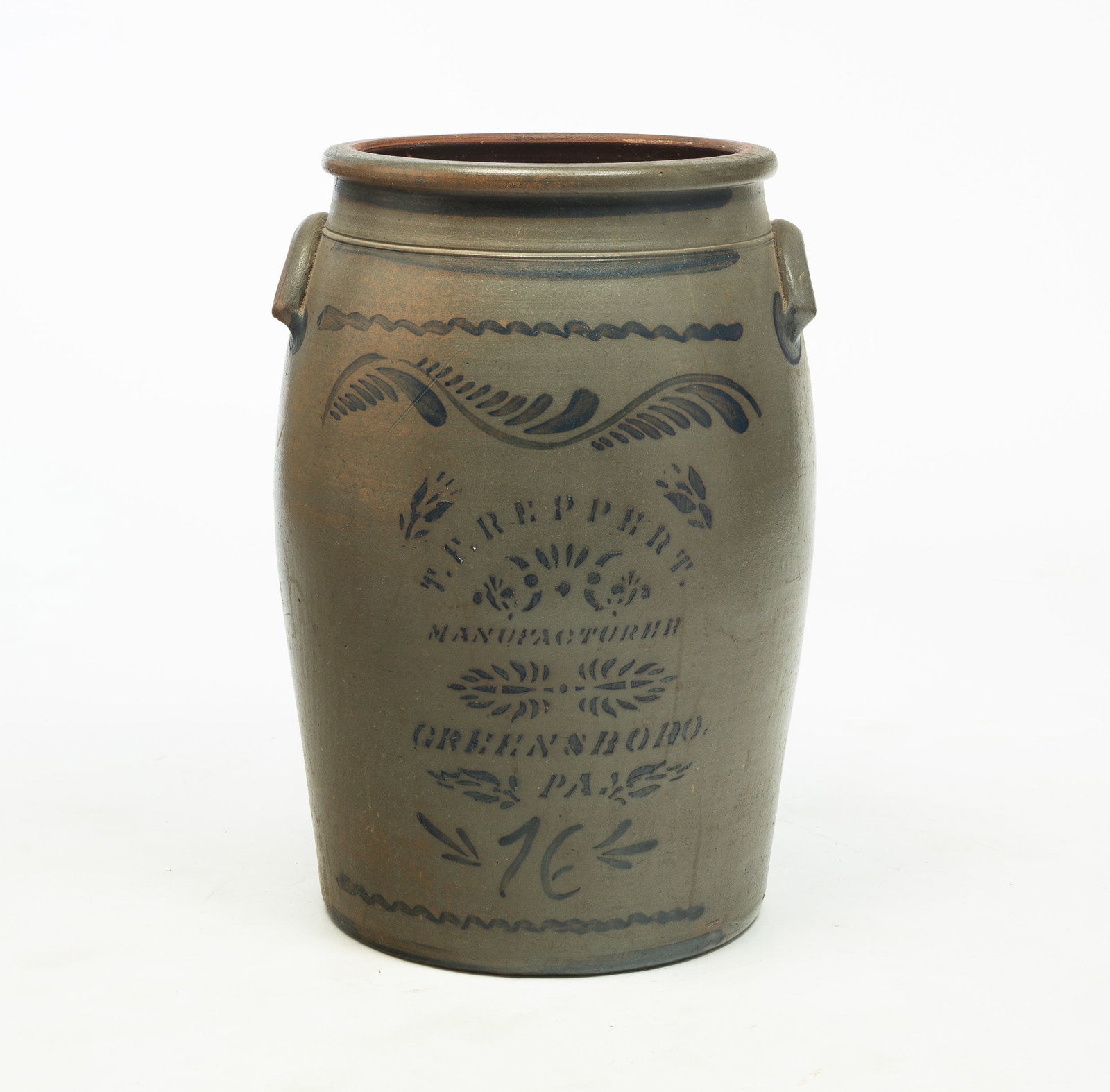 FINE T.F. REPPERT (GREENSBORO, PA) SIXTEEN-GALLON DECORATED STONEWARE JAR.: American (Southwestern Pennsylvania), 19th Century. Stenciled label with feathers, stylized freehand undulating vine, "16", squiggle, and lines. Lug handles with cobalt lollipop accents. Excellent con