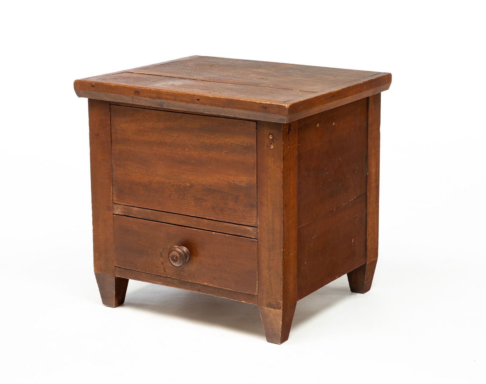 ZOAR POTTY CHAIR.: American, second-half 19th Century. Poplar. Lid with applied edge molding, corner posts terminating in truncated tapered legs, lower dovetailed drawer and old worn finish. Wear and age splits. 19"h. 1