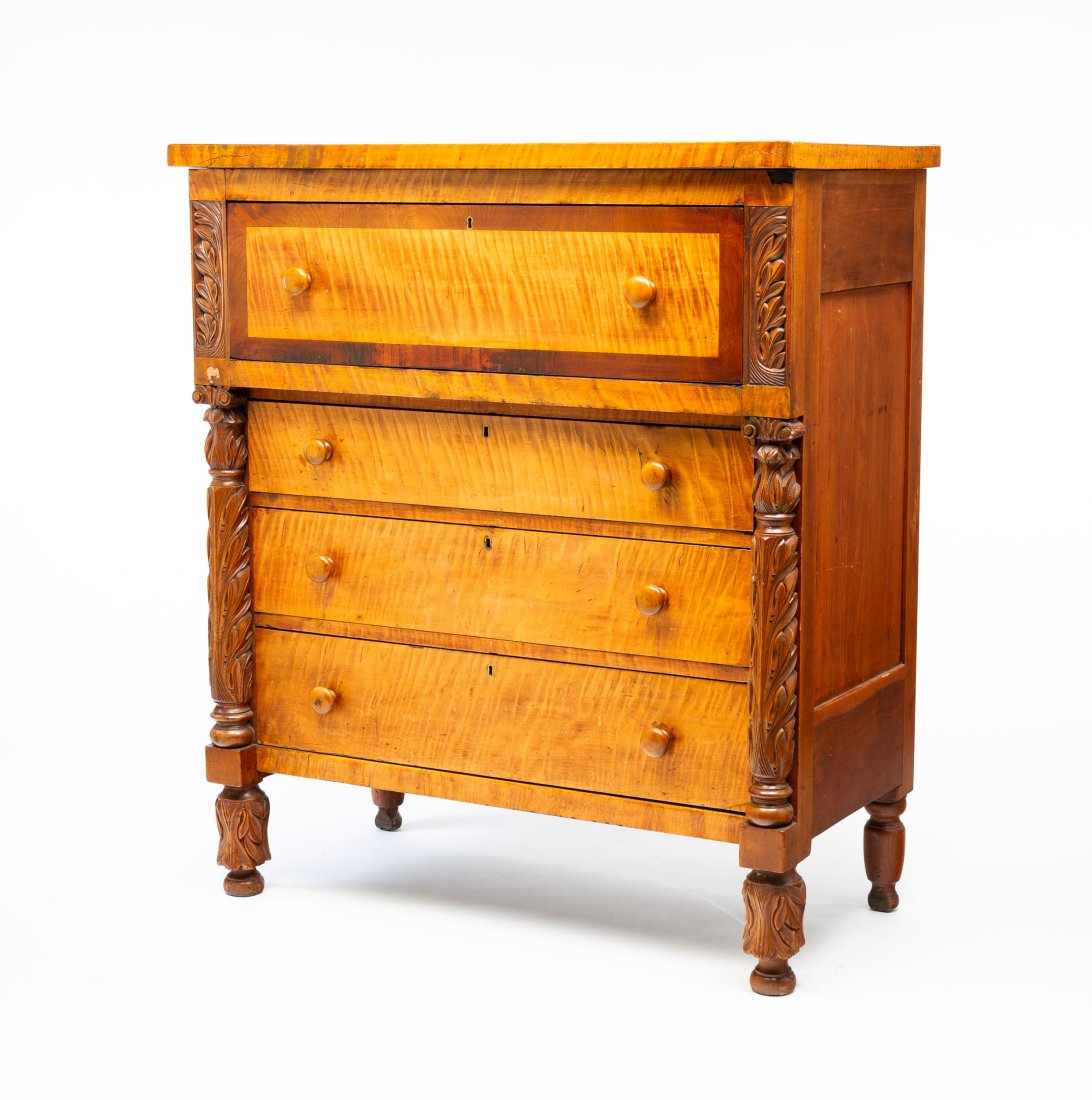 OHIO TRANSITIONAL CHEST OF DRAWERS.: American, second quarter 19th Century. Cherry, tiger maple, mahogany and poplar secondary. Paneled ends, foliate-carved stiles, pilasters and front feet and four dovetailed drawers. Made by Uriah Merw