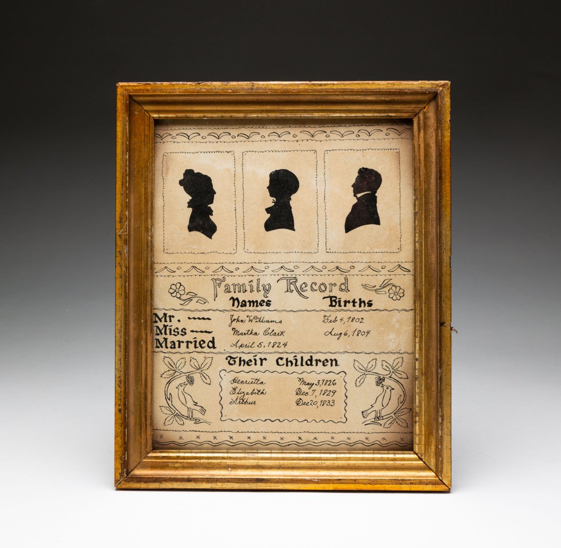 FAMILY RECORD WITH SILHOUETTES.: American, second quarter 19th Century. Three cut silhouetted at top with marriage and birth dates of the Williams family. Pen and ink border with floral and bird decoration. In a period frame. 11.5"h.