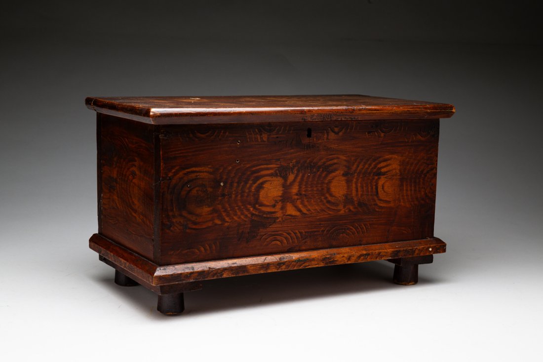 MINIATURE BLANKET CHEST.: American, late 19th Century. Pine. Miniature blanket chest with mustard grain painted surface. 9"h. 14"w. 8"d.