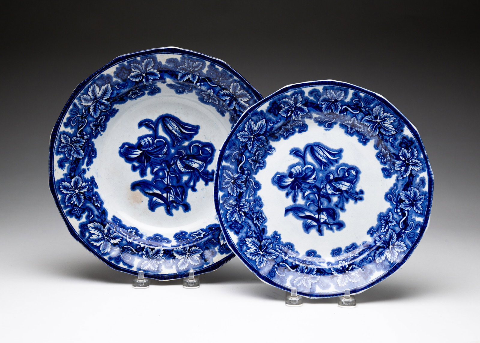 TWO PIECES OF PHILLIPS BLUE TRANSFER IRONSTONE.: Longport, England, Third quarter 19th Century. A pate and soup plate. "Lobelia" pattern. Some discoloration and edge wear.