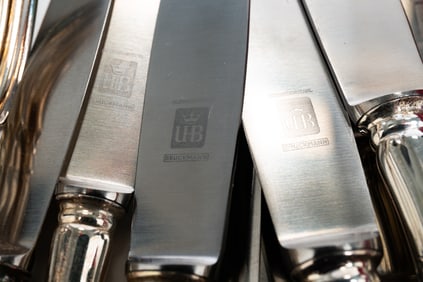 PARTIAL SET OF BRUCKMAN 800 SILVER FLATWARE.