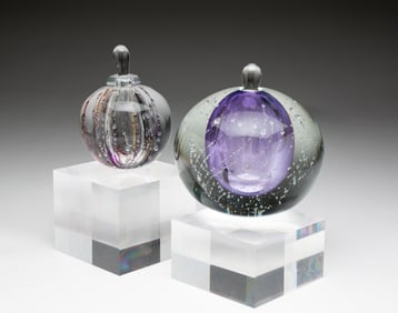 TWO LEON APPLEBAUM ART GLASS COLOGONES WITH STOPPERS.