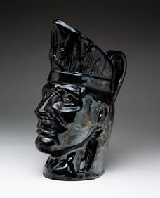 FIGURAL REDWARE PITCHER.