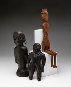 THREE FIGURAL WOOD CARVINGS.