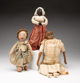 THREE FOLKSY DOLLS.