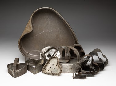 GROUP OF HEART SHAPED BAKING PIECES.