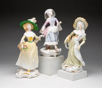 THREE "AGE OF ELEGANCE" ROYAL WORCESTER FIGURINES.