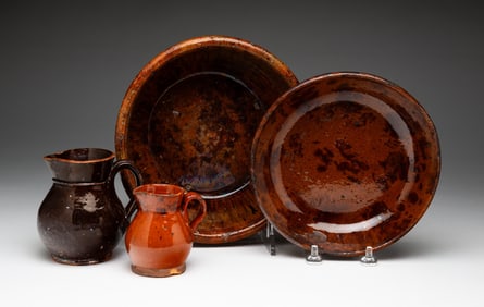 FOUR PIECES OF REDWARE.