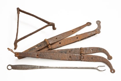 SEVEN PIECES OF FORGED IRON.