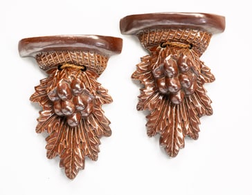 A PAIR OF SEWER TILE WALL BRACKETS.