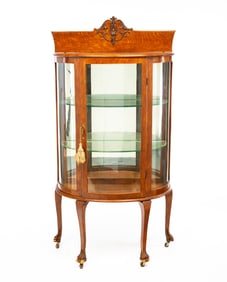 SMALL CURVED GLASS OAK CHINA CABINET.