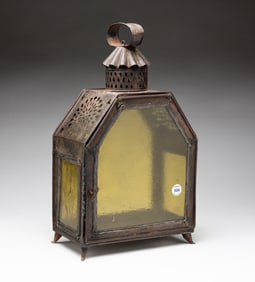 TIN LANTERN WITH OLIVE GLASS.
