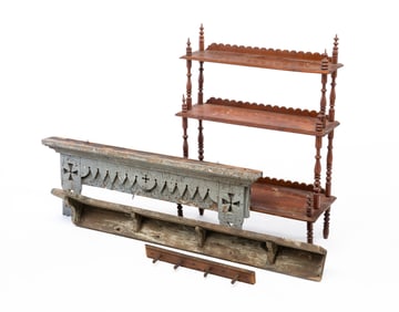 GROUP OF SHELVES AND A PEG RAIL.