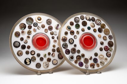 TWO GROUPS OF SHELL BUTTONS.