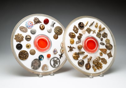 TWO GROUPS OF VINTAGE BUTTONS.