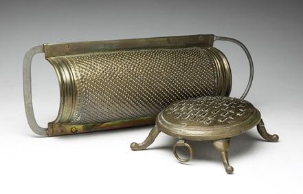TWO BRASS GRATERS.