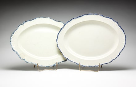 TWO ENGLISH FEATHER EDGE PLATTERS.