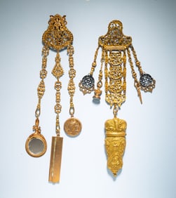 TWO VICTORIAN PINCHBECK CHATELAINES.