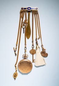 ANTIQUE CHATELAINE WITH GUILLOCHE CLIP.