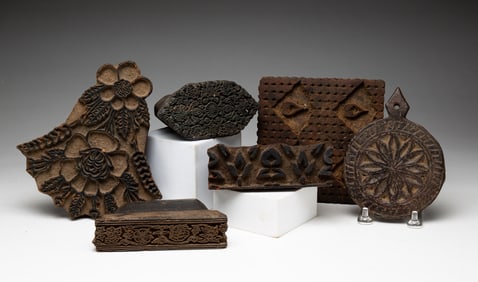 SIX BATIK PRINTING BLOCKS.