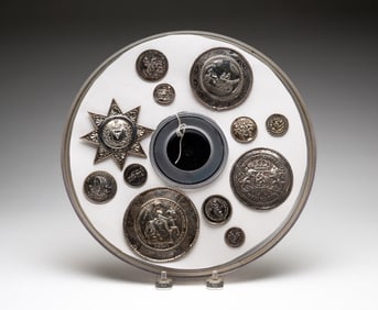 GROUP OF LARGE SILVER BUTTONS.