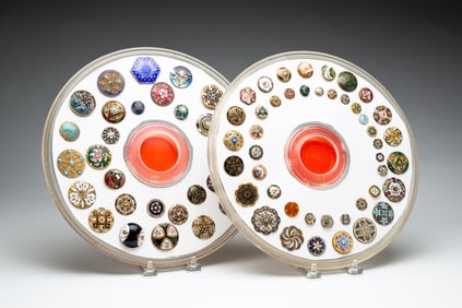 TWO GROUPS OF ENAMEL BUTTONS.