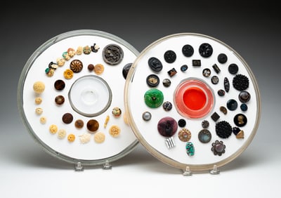 TWO GROUPS OF ANTIQUE BUTTONS.