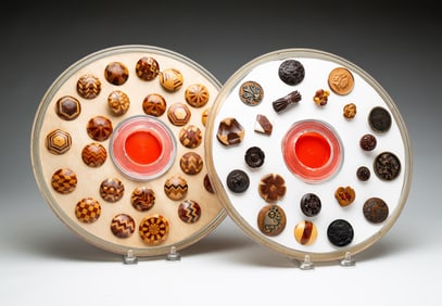 TWO GROUPS OF VINTAGE WOOD BUTTONS.