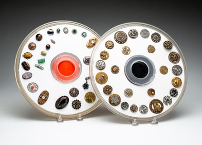 TWO GROUPS OF VINTAGE BUTTONS.