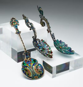 THREE LARGE PLIQUE A JOUR SPOONS.